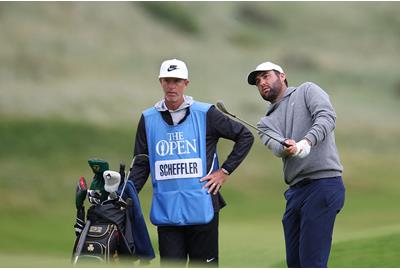 Scottie Scheffler and caddie Ted Scott during the 2025 Open Championship at Royal Portrush